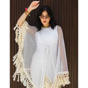 Open knit tasseled poncho